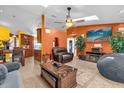 Bright living room flowing into the kitchen, offering an open concept layout with modern design at 2665 E Juliet Dr, Deltona, FL 32738