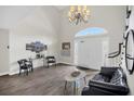 Bright foyer with chandelier, high ceilings and wood flooring at 4262 Lake Underhill Rd # 9C7, Orlando, FL 32803