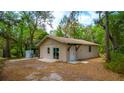 Exterior view of home with sliding glass doors and fresh paint at 530 Webster St, Lake Mary, FL 32746