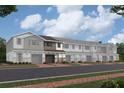 Exterior of newly built townhouses with attractive architectural details at 5099 Prairie Preserve Run, St Cloud, FL 34772