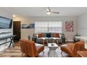 Inviting living room with stylish seating, wood floors, and ample natural light at 550 Birch Ct, Altamonte Springs, FL 32714