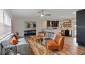 Spacious living room showcasing modern furnishings and an open floor plan to the kitchen at 550 Birch Ct, Altamonte Springs, FL 32714