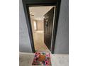 View of unit 4611's open floor plan from the front door, including the living area at 5525 Pga Blvd # 4611, Orlando, FL 32839