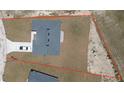 Aerial view showing the house with property lines and surrounding area at 13247 Sw 83Rd Cir, Ocala, FL 34473