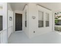 Inviting front porch featuring a stylish front door and ample natural light, creating a warm entrance at 3752 Cleary Way, Orlando, FL 32828