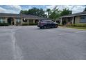 Convenient parking lot with ample space and well-kept surroundings at 207 Esplanade Way # 101, Casselberry, FL 32707