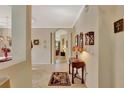 Inviting foyer with tile flooring, arched doorways, and decorative accents creating a warm ambiance at 11556 Via Lucerna Cir, Windermere, FL 34786