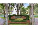 Beautiful Heathrow community sign surrounded by lush landscaping and a calming water feature at 220 Wimbledon Cir, Lake Mary, FL 32746