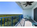 Relaxing balcony with seating and scenic nature views for outdoor enjoyment at 5300 S Atlantic Ave # 16-505, New Smyrna Beach, FL 32169