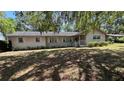Inviting one-story home with shuttered windows and a cozy front porch at 1329 Se 36Th Ave, Ocala, FL 34471