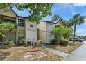 Attractive condo complex with lush landscaping providing a serene and inviting atmosphere at 1956 Lake Atriums Cir # 146, Orlando, FL 32839