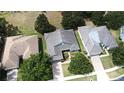 Bird's-eye view of the residence showing the home's roof, landscaping, and neighboring properties at 2503 Squaw Crk, Clermont, FL 34711