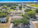 Scenic aerial shot capturing the property's neighborhood setting, with mature trees and well-kept lawns at 601 Francis St, Kissimmee, FL 34741
