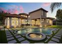 Backyard oasis features a private pool and spa, offering a perfect retreat for relaxation and entertainment at 9032 Tavolini Ter, Windermere, FL 34786