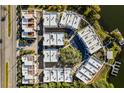 Birds-eye view of the contemporary community featuring modern townhomes and waterfront access at 1764 Mondrian Cir, Winter Park, FL 32789