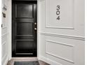 Unit 304 features a dark front door with white molding at 300 Carolina Ave # 304, Winter Park, FL 32789