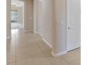 Open foyer showcases tile flooring leading to various rooms in the home at 553 Adenmore Ter, Deland, FL 32724