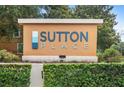 Welcoming Sutton Place community sign surrounded by lush greenery and landscaping at 1062 Winglewood, Altamonte Springs, FL 32714