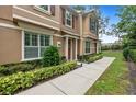 Beautiful two-story home with manicured lawn and tasteful exterior details at 1062 Winglewood, Altamonte Springs, FL 32714