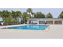 Community pool for residents with a lounge area and landscaped surroundings at 4727 S Texas Ave # 4727C, Orlando, FL 32839
