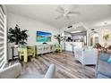 Open concept living area flowing into a stylish kitchen with modern appliances at 13415 Blue Heron Beach Dr # 409, Orlando, FL 32821