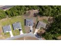 Overhead aerial view of a home on a large lot, new roof, paved drive, with nearby highway access at 13621 Sw 40Th Cir, Ocala, FL 34473