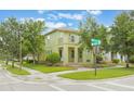 Charming two-story home situated on a corner lot with well-manicured landscaping at 14244 Walcott Ave, Orlando, FL 32827
