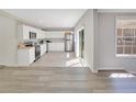 Open-concept kitchen boasts stainless steel appliances and ample countertop space at 2927 Ahern Dr, Orlando, FL 32817