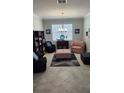 Inviting living room with neutral walls, tile floors, and plenty of natural light at 3986 Bedford Ave, Winter Haven, FL 33884