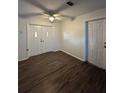 The living room has ample natural light and new flooring at 5123 Turnbull Dr, Orlando, FL 32812