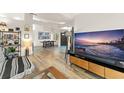 Bright living room featuring hardwood floors and an open floor plan at 546 Via Fontana Dr # 203, Altamonte Springs, FL 32714