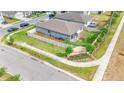Aerial view of the home's backyard, fencing, and surrounding neighborhood at 719 Tortugas St, Haines City, FL 33844
