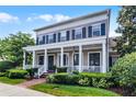 Beautiful two-story house boasting a large front porch with columns and well-maintained landscaping at 4474 Enders St, Orlando, FL 32814