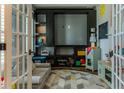 Charming playroom with built-in shelves, and a comfortable couch, ideal for activities at 459 Millwood Pl, Winter Garden, FL 34787