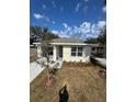 Attractive one-story home with a new roof and landscaping enhancing its curb appeal at 1007 Colyer St, Orlando, FL 32805