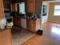 Kitchen showcasing wood cabinets and stainless steel appliances at 1206 Olen Dr, Daytona Beach, FL 32117
