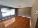 Empty living room featuring hardwood floors and natural light at 1206 Olen Dr, Daytona Beach, FL 32117