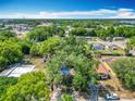 Spacious property showcasing lush greenery and mature trees in a quiet neighborhood setting at 1263 Dunbar St, Altamonte Springs, FL 32701