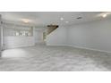 Spacious living room featuring tile floors, natural light, and an open layout at 1455 Blue Horizon Dr, Clermont, FL 34714