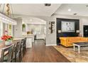 View of open concept showcasing kitchen, dining and living spaces with stylish decor and ample natural light at 2623 Gables Dr, Eustis, FL 32726