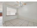 Bright, airy dining room featuring tile floors, a ceiling fan, and natural light at 316 Georgetown Dr # 316, Casselberry, FL 32707