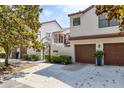 Beautiful townhome featuring a two-car garage, gated entry and well-maintained landscaping at 520 Via Verona Ln # 202, Altamonte Springs, FL 32714