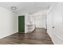 Bright living room features newer laminate floors and an inviting atmosphere at 520 Via Verona Ln # 202, Altamonte Springs, FL 32714