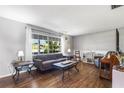 Bright living room featuring a large window and comfortable seating at 803 Arlington Blvd, Altamonte Springs, FL 32701