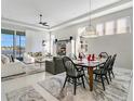A spacious living room and dining area featuring modern decor, lots of space and natural light at 891 Megano Blvd, Deland, FL 32724