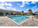 Community swimming pool with lounge chairs offers a relaxing outdoor experience at 1109 Pavia Dr, Apopka, FL 32703
