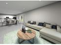Open-concept living room and kitchen with modern decor and a neutral color palette at 16544 Silver Brook Way, Winter Garden, FL 34787