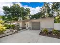 Charming single-story home with a well-maintained front yard and attached garage at 3049 Condel Drive, Orlando, FL 32812