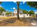 Beautiful two-story home featuring a classic design and serene surroundings, offering a peaceful retreat at 712 Maryland Ave, St Cloud, FL 34769