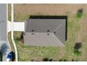 Overhead view of a single Gathering home with a well-maintained roof and driveway at 1119 Union Ave, Mascotte, FL 34753